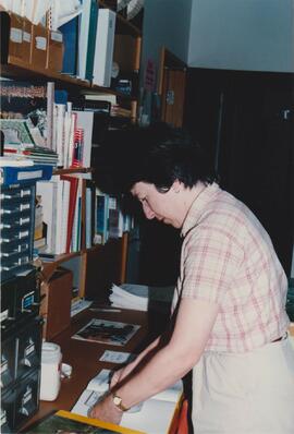 Heidi Chard processing a book