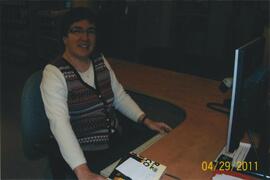 Heidi Northover at the reference desk - 100 Holland Court