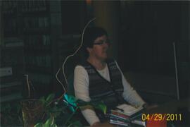 Heidi Northover working at the reference desk - 100 Holland Court