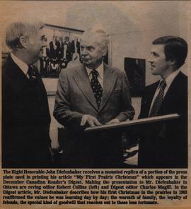 John Diefenbaker receives a mounted replica of a portion of the press plate