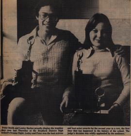 Peter Smith and Lesley Barker proudly display trophies