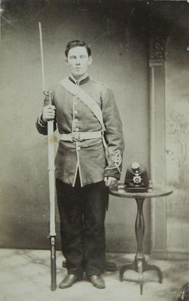 Soldier posing with bayonet